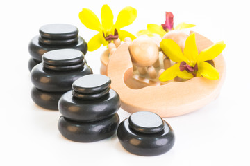 Spa therapy with hot stones, massage roller and cellulite massager