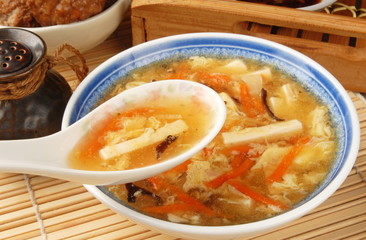 Spoon full of hot and sour soup    