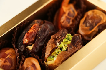 Dried dates with nuts in a box