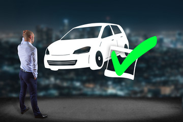 Business man in front of a wall with a Verified car ready to go - transportation and travel concept