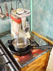 kitchen table with a meat grinder