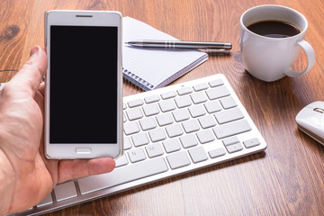 Modern office workplace with a cup of coffee