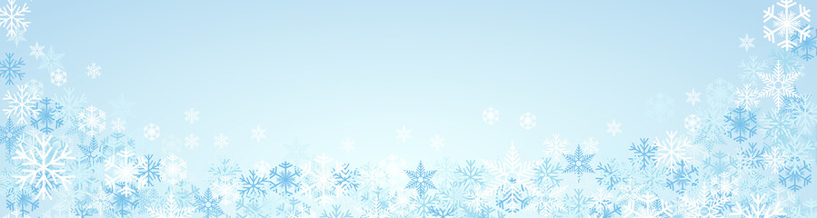 Fototapeta na wymiar Festive banner Christmas background and winter with copy space. snow and ice crystals on blue sky