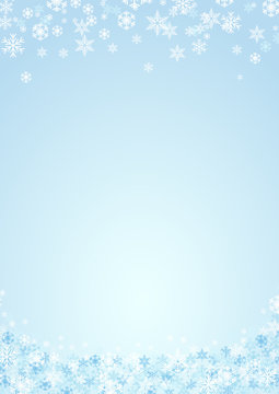 Festive vertical Christmas background and winter with copy space. snow and ice crystals on blue sky