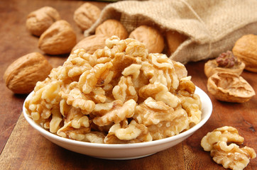 Walnut kernel  in a white bowl        