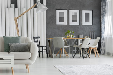 Beige sofa in dining room