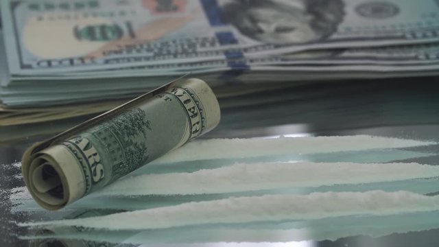 One dollar bank note on the cocaine powder 