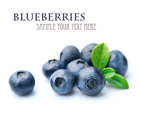 Blueberries with leaves.