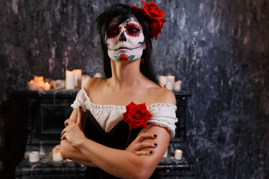 Halloween image of woman with makeup and roses