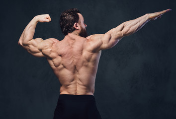 Image of a bodybuilder from a back.