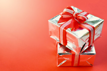 Gift box on red background for Christmas concept