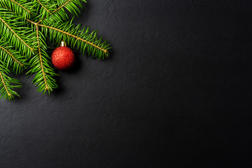 Christmas background with tree and red Christmas ball