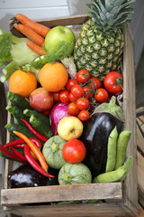 box full of fresh fruits and vegetables from the greengrocer