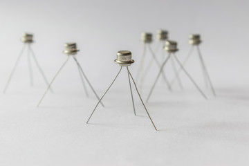 Transistors stand on legs.