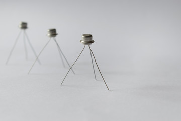 Transistors stand on legs.