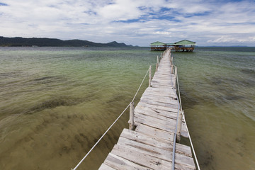wooden bridge to the water bungalow