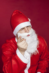 Santa Claus threatens you with a finger