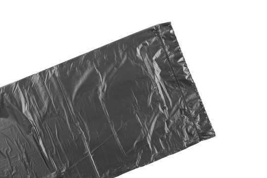 Black plastic garbage bag, isolated on white background, top view