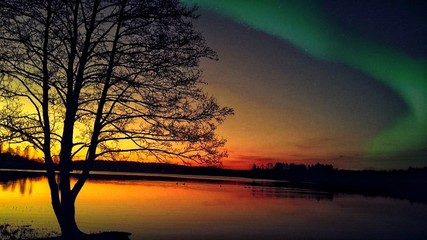Fototapeta na wymiar Sunset over a lake in sweden