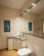 Fototapeta na wymiar Modern bathroom with large mirror