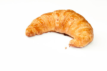 freshly baked croissants on white background, top view