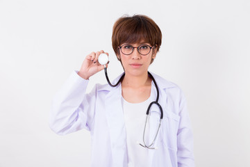 Young Asia Doctor with stethoscope. Isolated on white background. Studio lighting. Concept for healthy