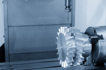 The 5-axis CNC machining center cutting the turbine  part.The Aerospace part manufacturing process...