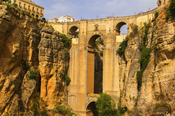 background view of the valley, rock and Ponte Nuevo in Ronda, Andalusia, Malaga