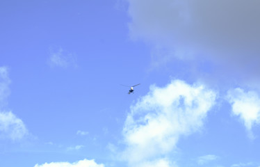 helicopter high in the sky