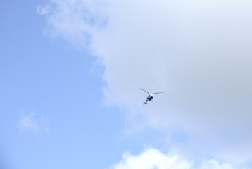 helicopter high in the sky
