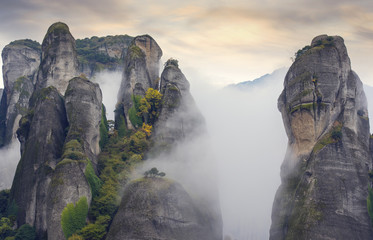 Fog above mysterious cliffs, foggy autumn landscape