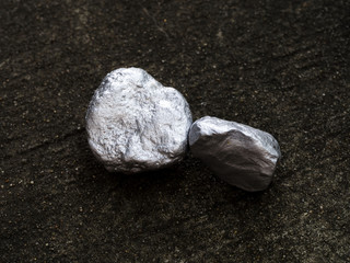 macro silver ore , Precious stone on the stone floor