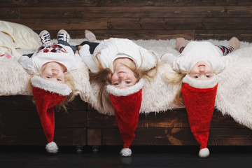 cute happy children with santa hats