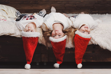 cute happy children with santa hats