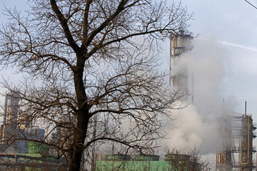 Fototapeta na wymiar Steel mills Smoke and powder dust pollution in large industrial District