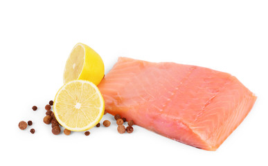 Two slices of red fish with rosemary on a white  background. Closeup. on a white