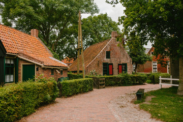 Fototapeta na wymiar Old brick houses in the Netherlands.