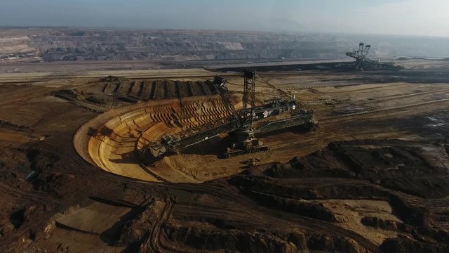 Aerial footage of a giant bucket-wheel excavator mining in Garzweiler, Germany