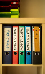 File folders with exercises from students of a montessori school class