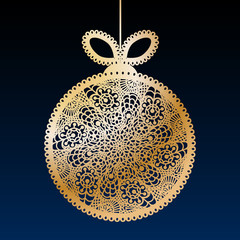 Decorative golden lace Christmas ball toy on dark blue background