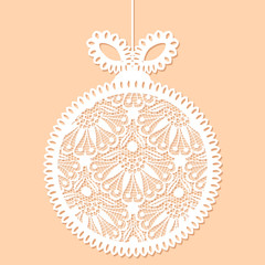 Decorative white lace Christmas ball toy on beige background