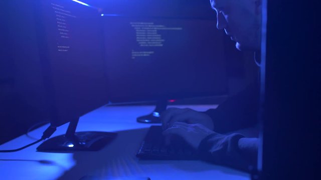 hacker using computer virus for cyber attack