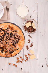 Sweet chocolate pizza with cookies. 