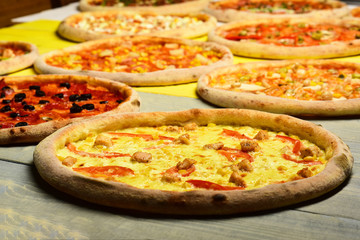 Take away food with various ingredients and crunchy edges.