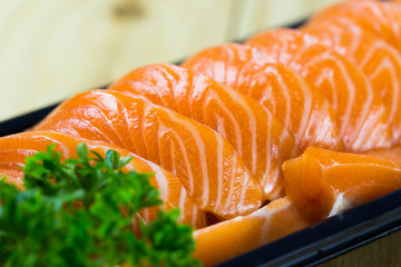 Salmon fish in plastic box