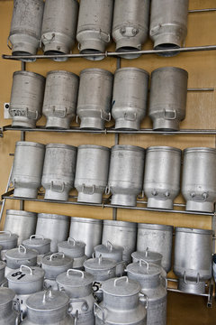 Milk Cans in a cheese dairy, Les Hauderes, Valais, Switzerland