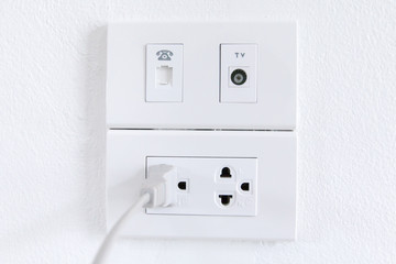 White electric plugs on wall background,White outlet interior, interior electric outlet in home,Socket electricity interior