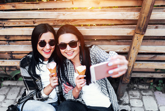 Two Long Hair Pretty Girls Making Selfie Outdoor