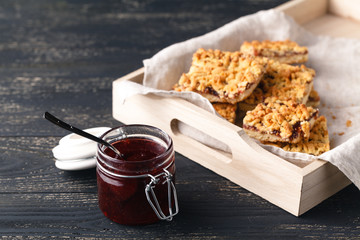 Close-up of home-made biscuits and a cup of tea on the table