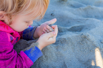 kid loving the beach